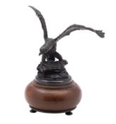 A Continental patinated bronze model of an eagle alighting,