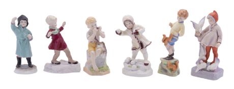 Six Royal Worcester porcelain 'month' figures modelled as children after the originals by Freda