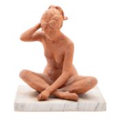 Three terracotta studies of female nudes in various poses, one mounted on a marble plinth,