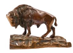 A patinated bronze model of a bison, 20th century; modelled,