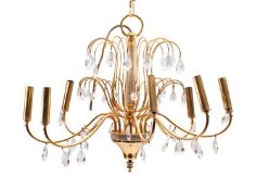 A gilt metal and glass hung eight light chandelier,