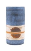 A Troika pottery cylinder vase decorated on a textured ground with a band of discs in russet tones