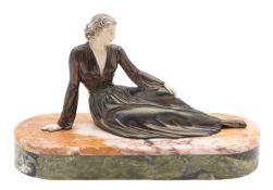 An Art Deco cold painted metal and marble mounted model of a maiden,