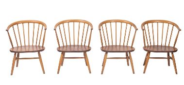 A set of four beech 'Cow Horn' elbow chairs by Ercol, circa 1965.