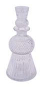 A thistle shaped decanter with slice and hob nail cut decoration the stopper in the form of a