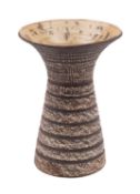 *Waistel Cooper [1921 - 2003] a stoneware vase of waisted and flaring form with iron and cream