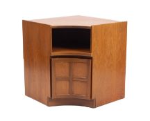 A teak concave corner cupboard by Nathan, mid 20th Century.