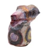 Linda Styles [b 1954] a terracotta sculpture of an animal head with incised and vibrantly coloured