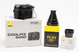 A Nikon coolpix 8400 digital camera. Ser