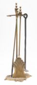 A brass fire tool companion stand, 20th