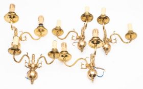 A set of five brass twin light wall appl