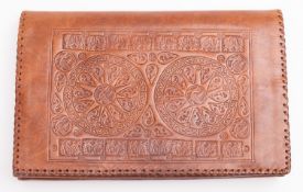 A 1960s North African brown tooled leath