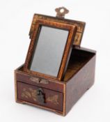 A small Chinese decorated red lacquer tr