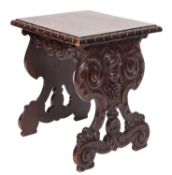 An Italian carved and stained oak stool in Renaissance taste,