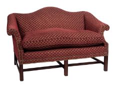 A mahogany and upholstered 'camel back' sofa in George III style,