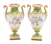 A pair of early 19th century Coalport urn-shaped vases, with swan neck handles,