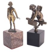 A Continental bronze model of Cupid,