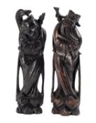 A pair of Chinese wire-inlaid carved hardwood figures of Immortals, late Qing dynasty, 33/34cm.