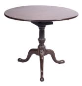 A George II walnut circular occasional table,