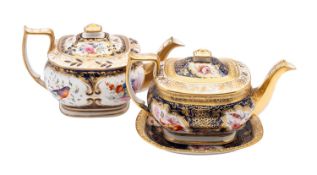 A group of four Coalport porcelain teapots, covers and one stand,
