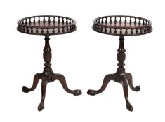 A pair of mahogany tripod stands in George III style,