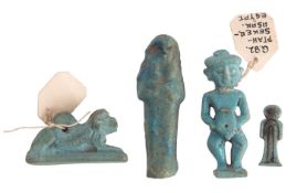 Four Egyptian faience glazed items, Late Period, 664-332 B.C.; comprising two shabti figures, 4.