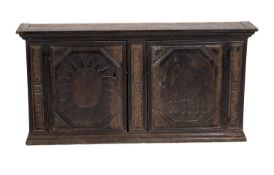 A Continental, probably French stained hardwood hanging cabinet,