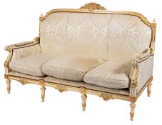 A pair of carved, painted and parcel giltwood sofas in Neapolitan 18th century taste,