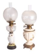 A French porcelain table oil lamp, the stem in the form of an owl,