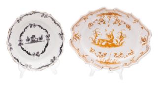A Moustiers faience shaped oval dish and a similar Auxerre shaped circular plate,