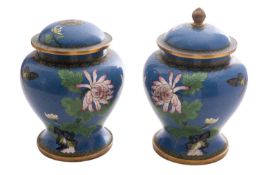 A pair of Chinese cloisonne baluster vases and covers,