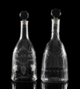 Two late 18th Century glass mallet-shaped decanters and stoppers one engraved with fruiting vines