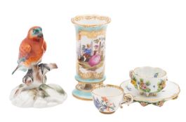 A group of Meissen porcelain comprising: a small lobed cabinet cup and saucer applied and painted