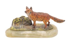 A Continental cold painted bronze menu holder modelled with a fox,