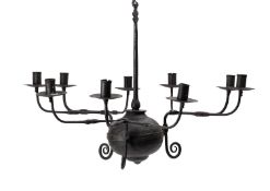 A wrought iron nine-light chandelier in early 18th century taste,