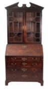 A George III mahogany and glazed bureau bookcase,