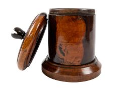 A lignum vitae string barrel,