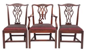 An associated group of nine George III mahogany dining chairs, in Chippendale taste,