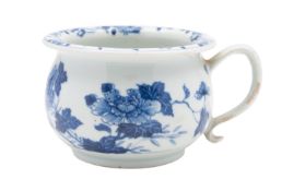 A Chinese Nanking Cargo child's chamber pot, mid 18th century painted with peony sprays,