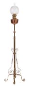 A Victorian brass and copper mounted standard lamp,