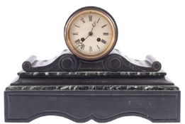 A late-Victorian French black marble mantel clock the eight-day duration movement striking the