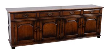 A substantial oak dresser, by Titchmarsh & Goodwin,