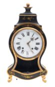 An unusual quarter striking bracket clock with bracket the eight-day duration movement striking the