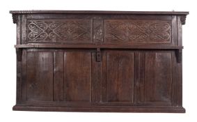 A stained oak overmantel in Jacobean style,