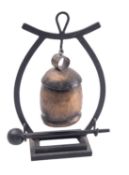 A Chinese-style patinated metal bell on stand, modern, 32cm with striker.
