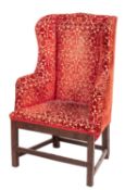 A George II wing armchair,