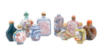 A collection of ten Chinese porcelain, enamel and hardstone snuff bottles,