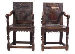 Two similar oak wainscot chairs, later 17th century; the rectangular backs with stylised arched,