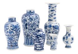 Six Chinese porcelain vases each painted in blue variously with figures, dragons,