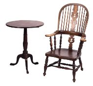 An elm, ash and yew elbow chair in the manner of a Windsor,